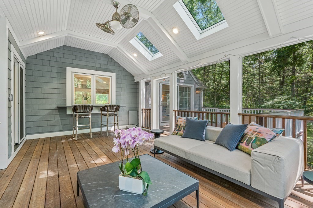 255 Westerly Road Weston, MA 02493 - Photo 20 of 35 a living room with furniture and floor to ceiling windows