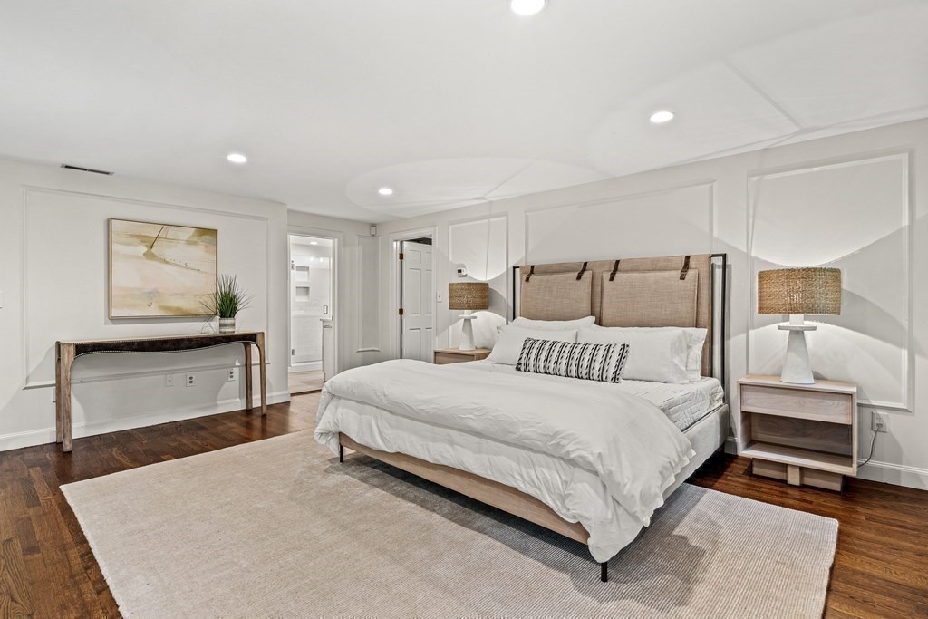 255 Westerly Road Weston, MA 02493 - Photo 21 of 35 a large white bed in a white room