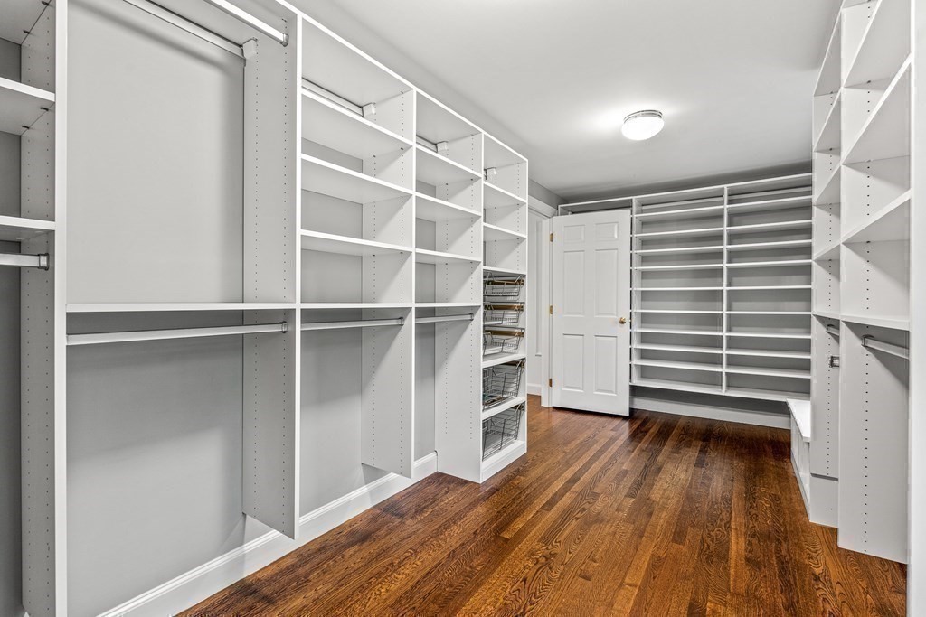 255 Westerly Road Weston, MA 02493 - Photo 24 of 35 a view of walk in closet with empty racks