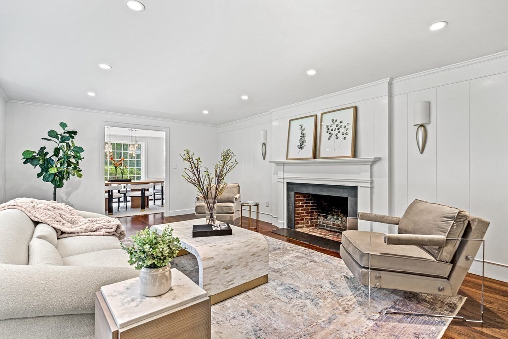 255 Westerly Road Weston, MA 02493 - Photo 4 of 35 a living room with furniture fireplace and potted plant
