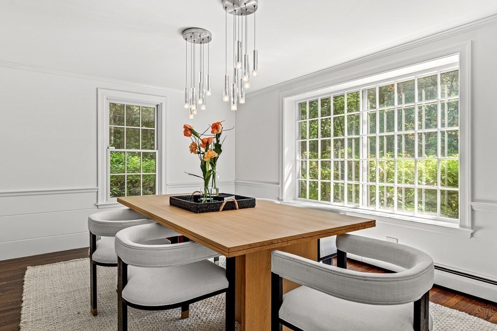 255 Westerly Road Weston, MA 02493 - Photo 6 of 35 a view of a dining room with furniture window and outside view