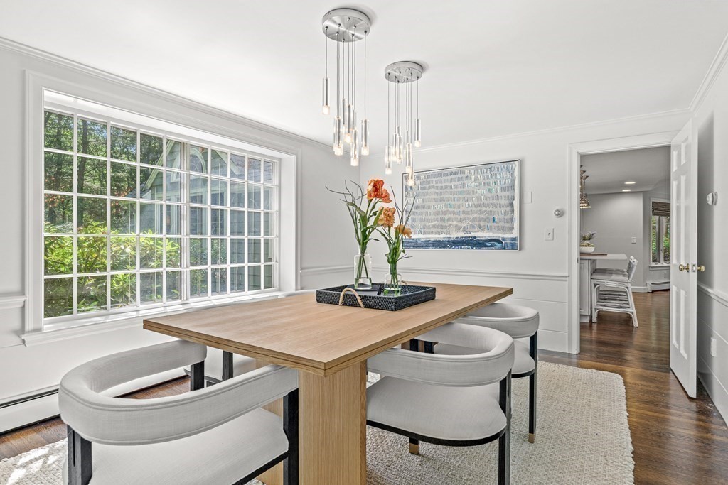 255 Westerly Road Weston, MA 02493 - Photo 7 of 35 a view of a dining room with furniture window and wooden floor