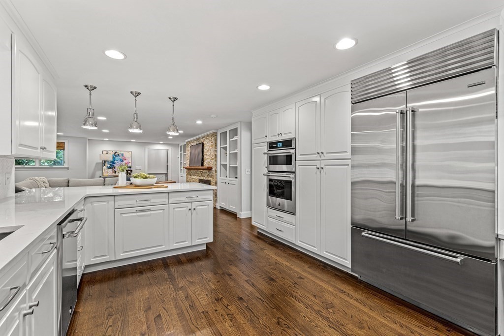 255 Westerly Road Weston, MA 02493 - Photo 10 of 35 a kitchen with white cabinets and appliances