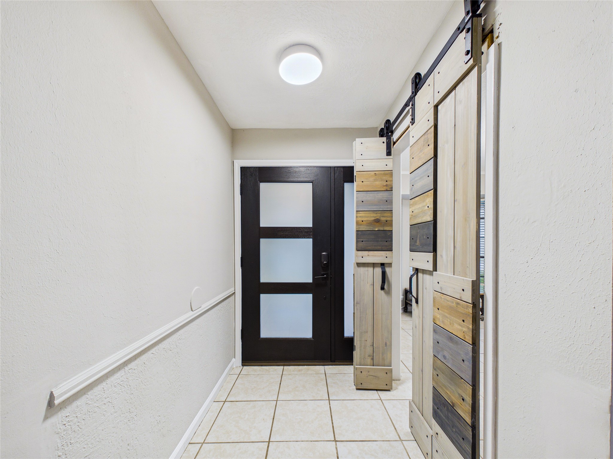10306 Rustic Rock Road La Porte, TX 77571 - Photo 30 of 38 a view of an entryway with wooden floor