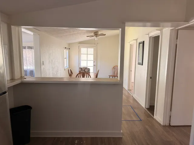 a view of bathroom with shower and window