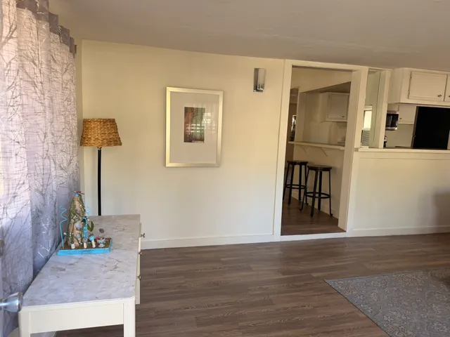 a view of livingroom with furniture and wooden floor