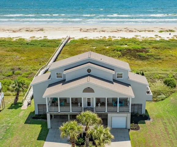 a view of a house with a ocean view