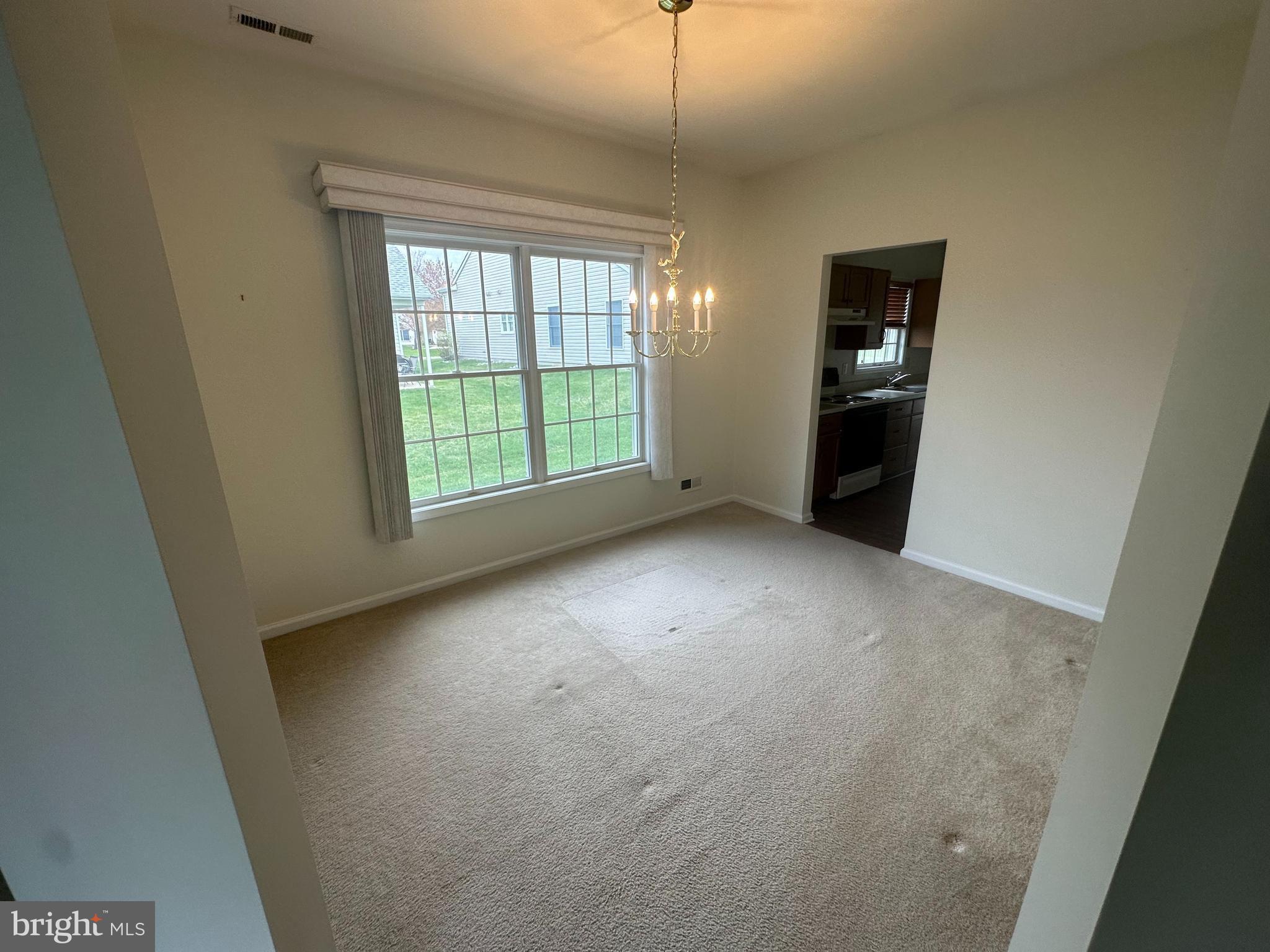 39 Sunset Lane Columbus, NJ 08022 - Photo 3 of 12 an empty room with windows
