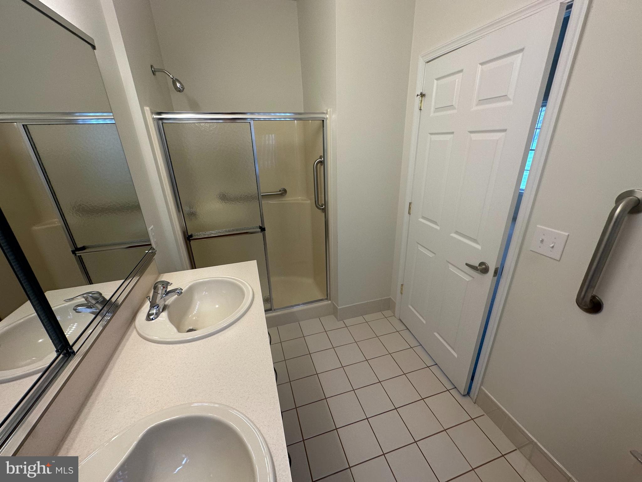 39 Sunset Lane Columbus, NJ 08022 - Photo 9 of 12 a bathroom with a granite countertop sink toilet and shower