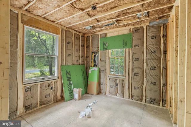 an empty room with windows