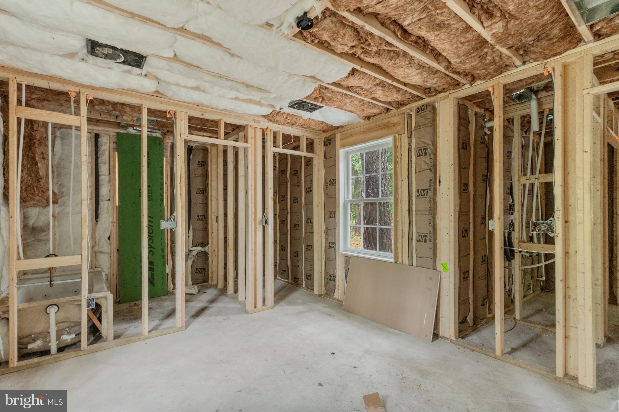 26471 3 Bridges Road Federalsburg, MD 21632 - Photo 8 of 14 an empty room with windows