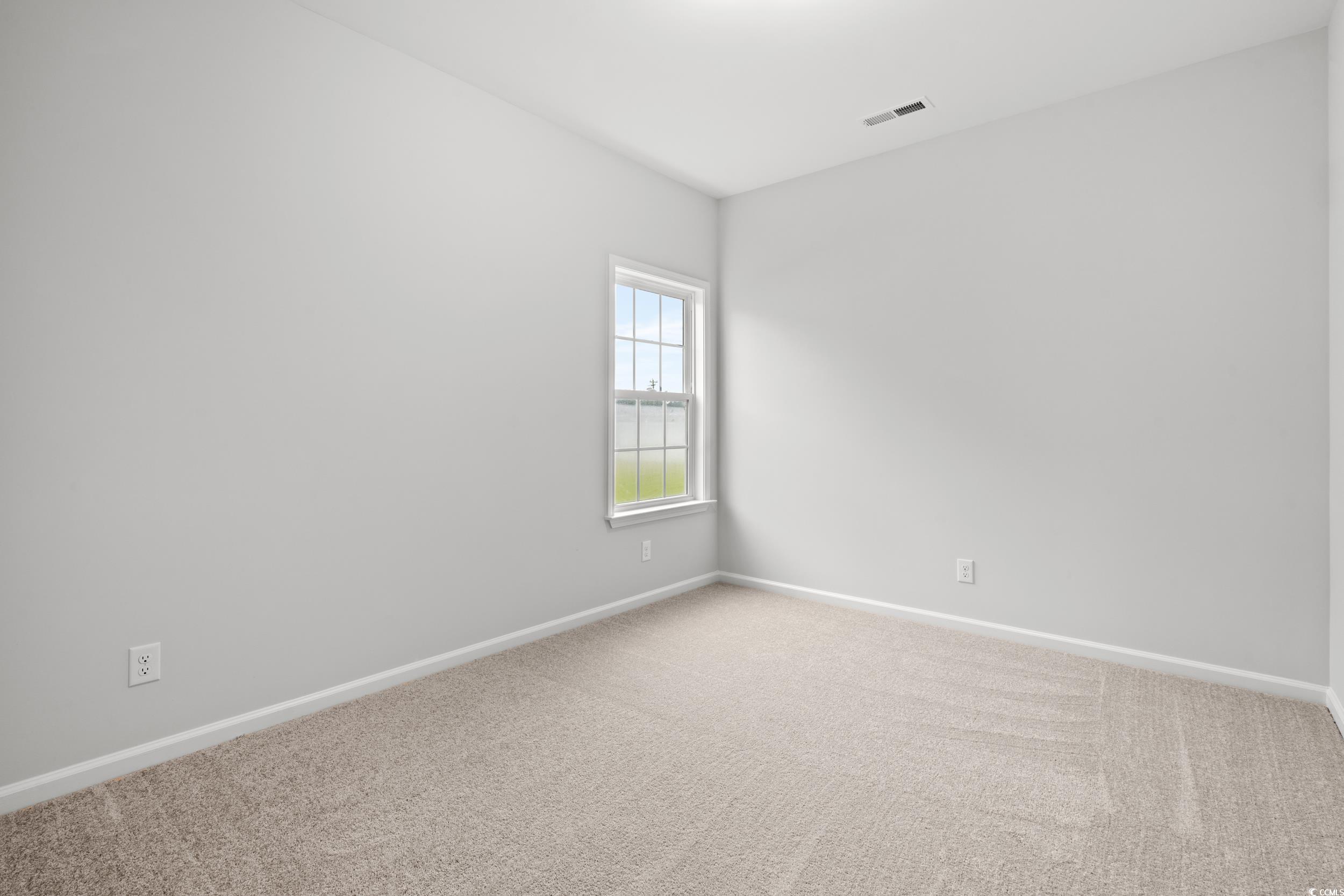 267 Stillbrook Drive Longs, SC 29568 - Photo 14 of 37 Spare room featuring carpet and baseboards