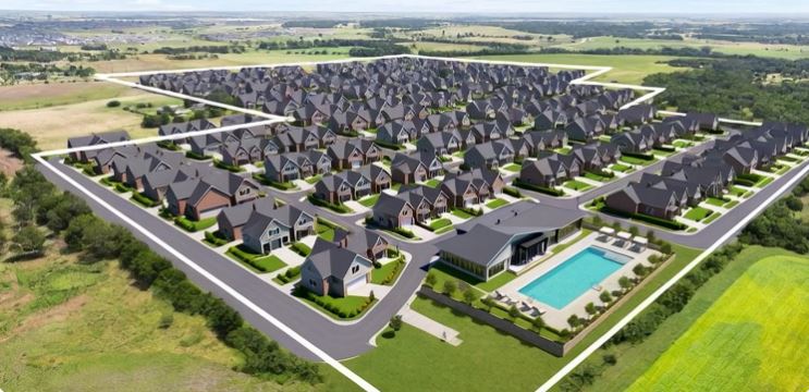 Aerial view of residential area featuring a pool