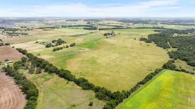 a view of an ocean and a mountain