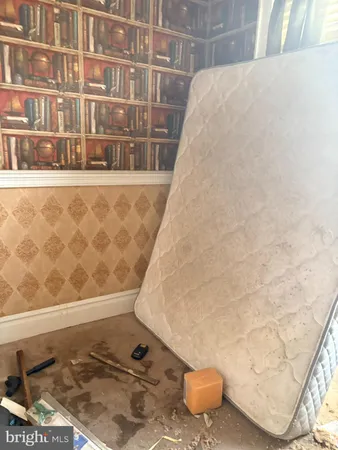 a backyard of a house with barbeque oven