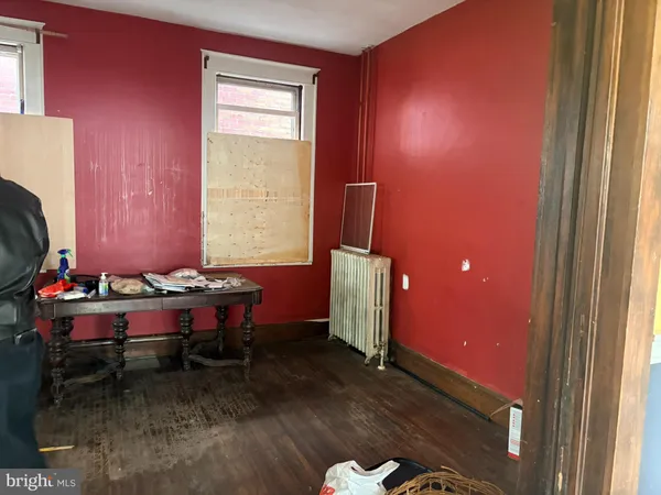 a room with furniture and a gate