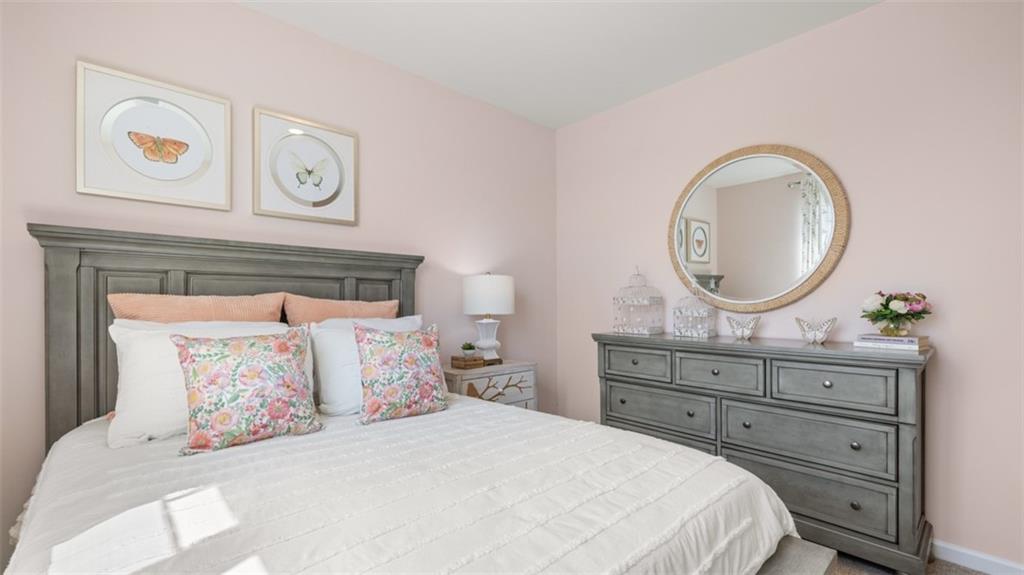 207 Cattle Drive Perry, GA 31069 - Photo 25 of 52 a bedroom with a bed and a dresser