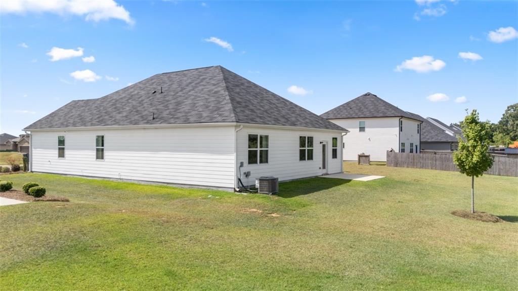 207 Cattle Drive Perry, GA 31069 - Photo 3 of 52 a view of a house with a backyard and porch
