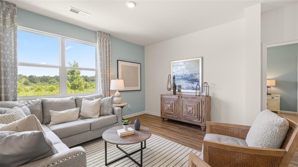 207 Cattle Drive Perry, GA 31069 - Photo 35 of 52 a living room with furniture and a window