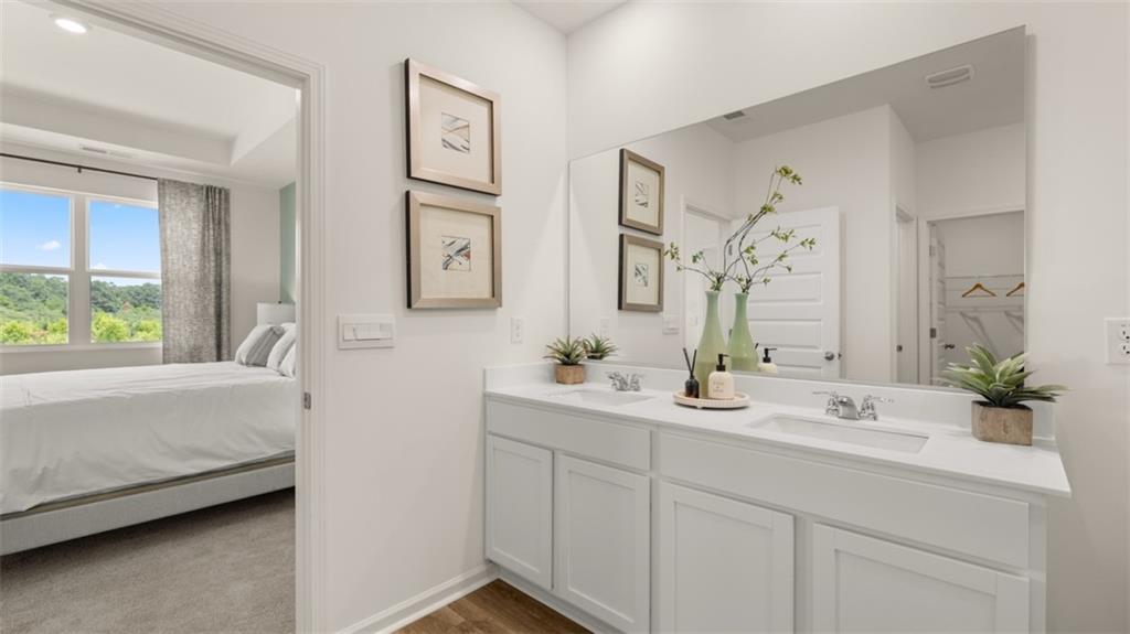 207 Cattle Drive Perry, GA 31069 - Photo 40 of 52 a bathroom with double vanity and a mirror