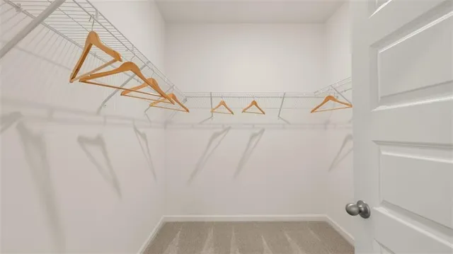 a view of a house with backyard and swimming pool