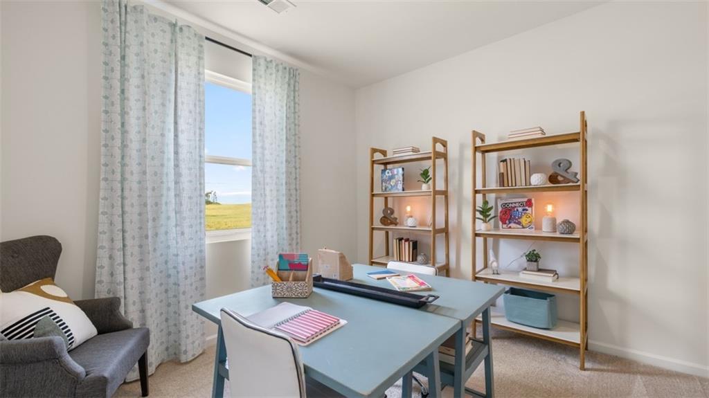 207 Cattle Drive Perry, GA 31069 - Photo 42 of 52 a view of a workspace with furniture and toys