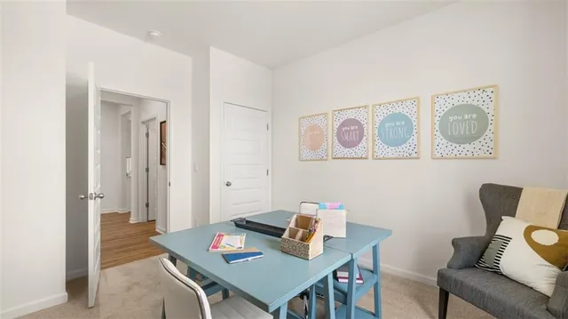 a swimming pool with outdoor seating and yard