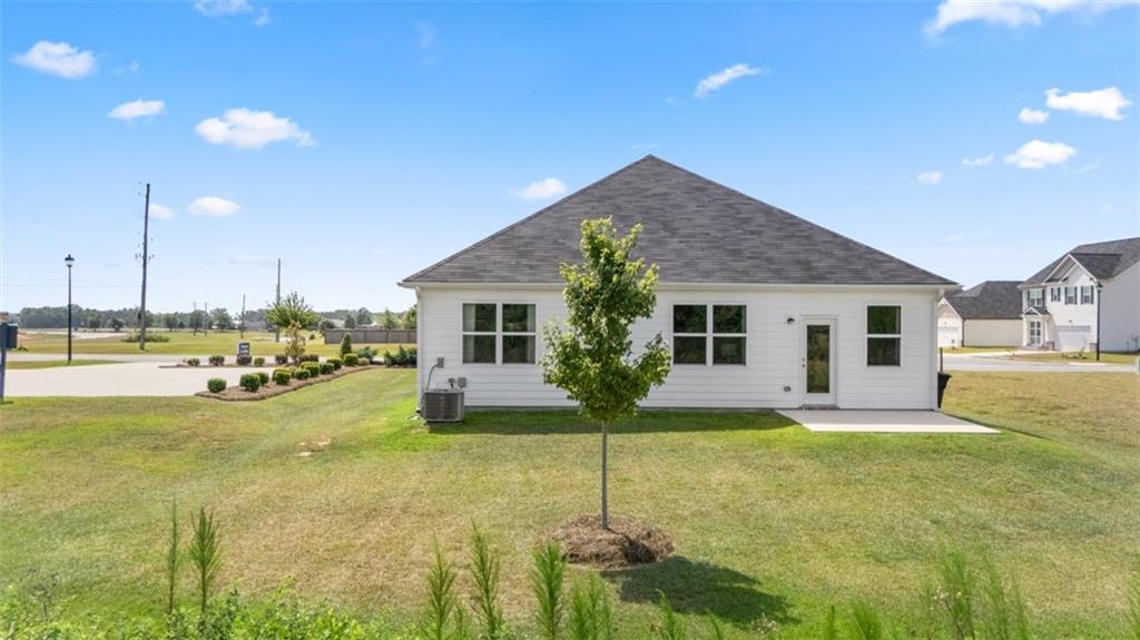 207 Cattle Drive Perry, GA 31069 - Photo 52 of 52 a view of a house with a yard patio and fire pit