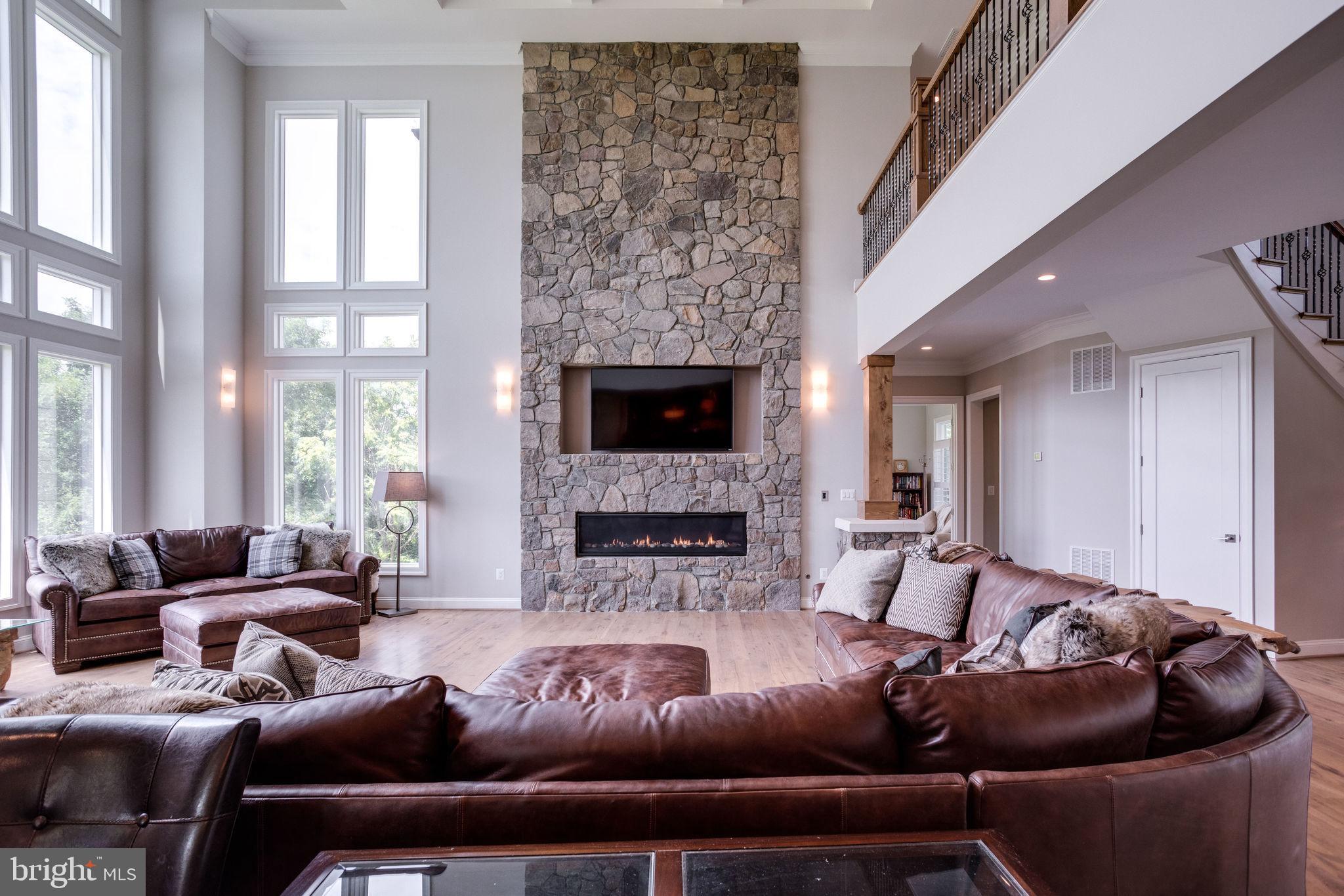 41820 Reservoir Road Leesburg, VA 20175 - Photo 33 of 131 Stone Wall w/TV insert & Gas FP w/Stone Burners