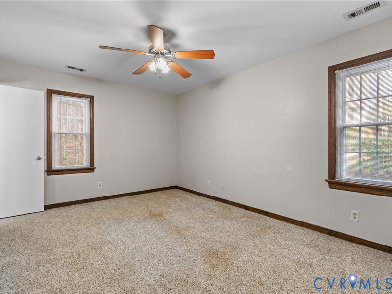 11906 Lockett Ridge Place Midlothian, VA 23114 - Photo 11 of 20 Spare room with plenty of natural light, carpet, a