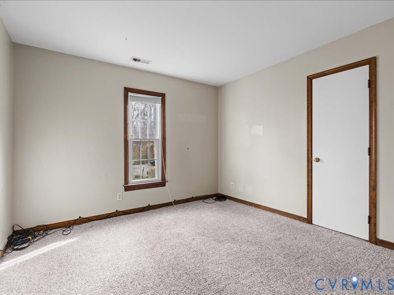 11906 Lockett Ridge Place Midlothian, VA 23114 - Photo 15 of 20 Carpeted empty room with baseboards