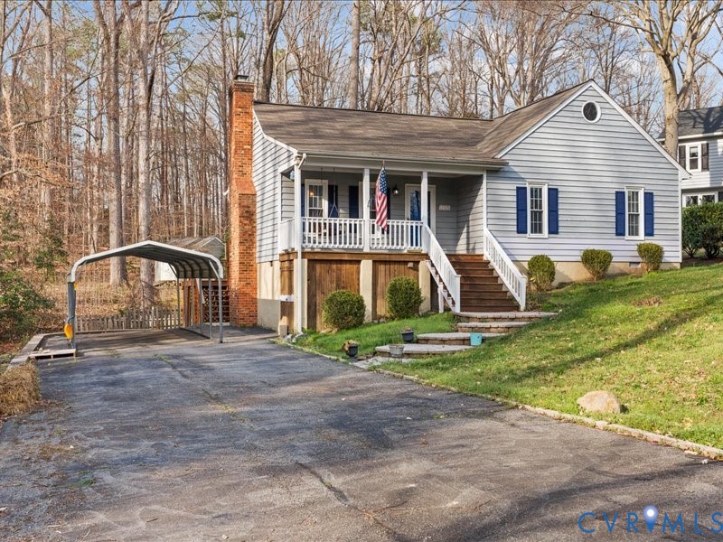 11906 Lockett Ridge Place Midlothian, VA 23114 - Photo 2 of 20 View of front facade featuring covered porch, a ch