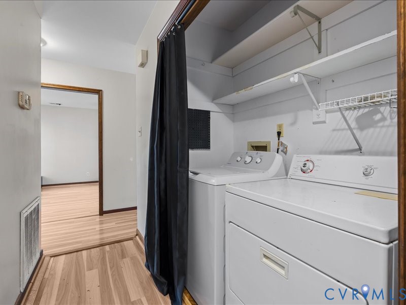 11906 Lockett Ridge Place Midlothian, VA 23114 - Photo 10 of 20 Laundry area with light wood-style floors and sepa