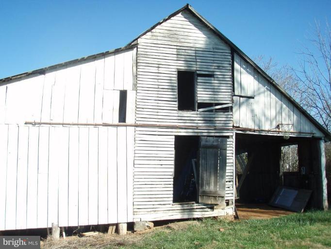 487 Rudasill Mill Road Woodville, VA 22749 - Photo 17 of 30 a front view of a house with a yard
