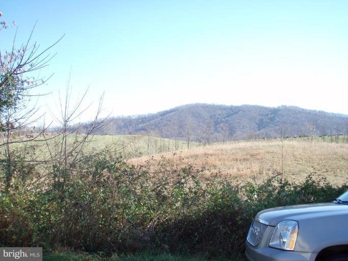 487 Rudasill Mill Road Woodville, VA 22749 - Photo 18 of 30 a view of a city from a yard