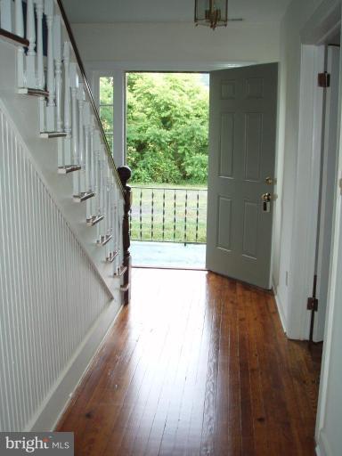 487 Rudasill Mill Road Woodville, VA 22749 - Photo 22 of 30 a view of an entryway with wooden floor