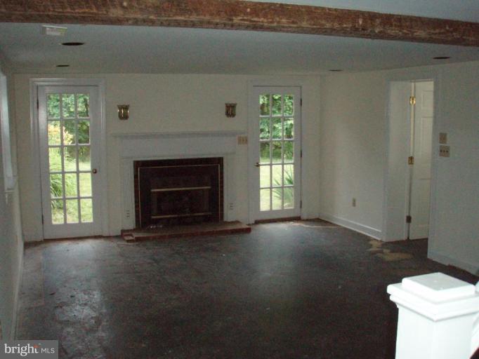487 Rudasill Mill Road Woodville, VA 22749 - Photo 24 of 30 a view of empty room with a fireplace