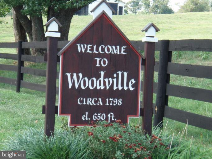 487 Rudasill Mill Road Woodville, VA 22749 - Photo 30 of 30 a sign on the side of a building