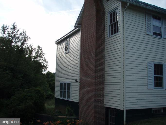 487 Rudasill Mill Road Woodville, VA 22749 - Photo 4 of 30 a view of a house with a yard
