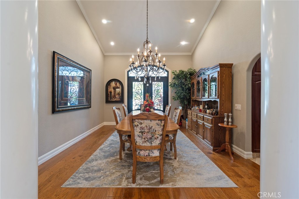 10588 Silver Spur Court Rancho Cucamonga, CA 91737 - Photo 21 of 63 a view of a dining room with furniture and window