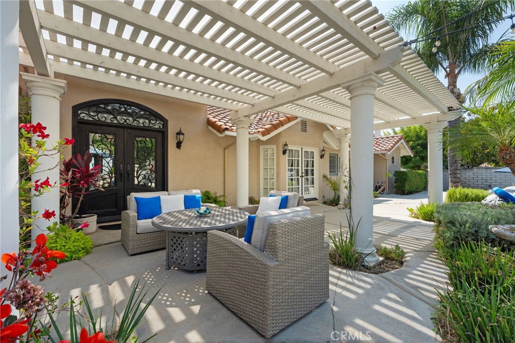 10588 Silver Spur Court Rancho Cucamonga, CA 91737 - Photo 47 of 63 a outdoor living space with furniture and garden view