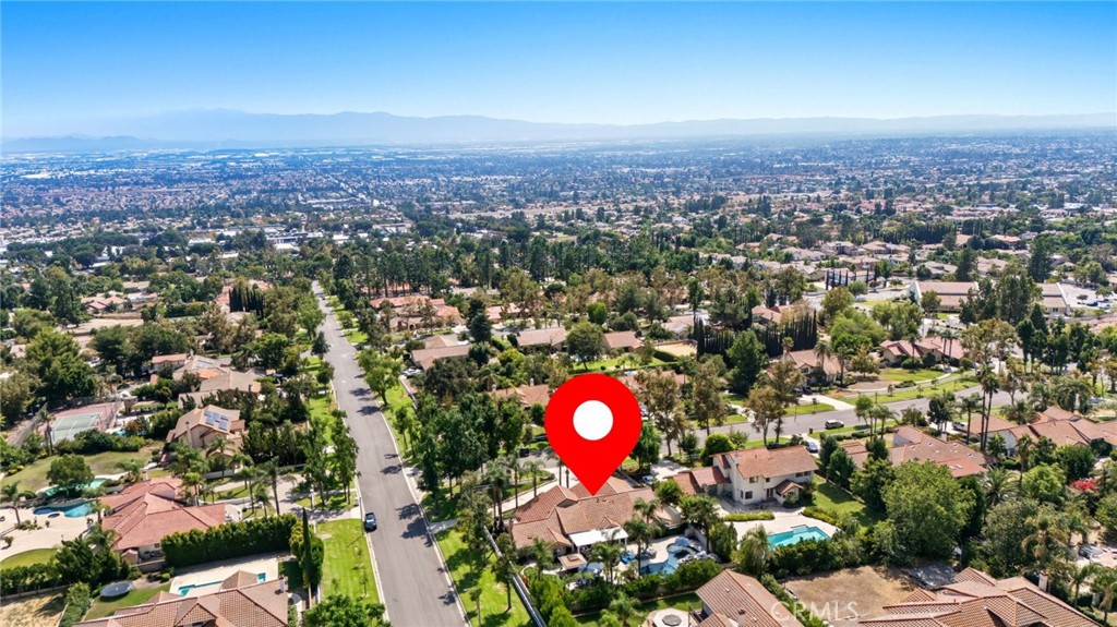 10588 Silver Spur Court Rancho Cucamonga, CA 91737 - Photo 62 of 63 an aerial view of a city with lots of residential buildings