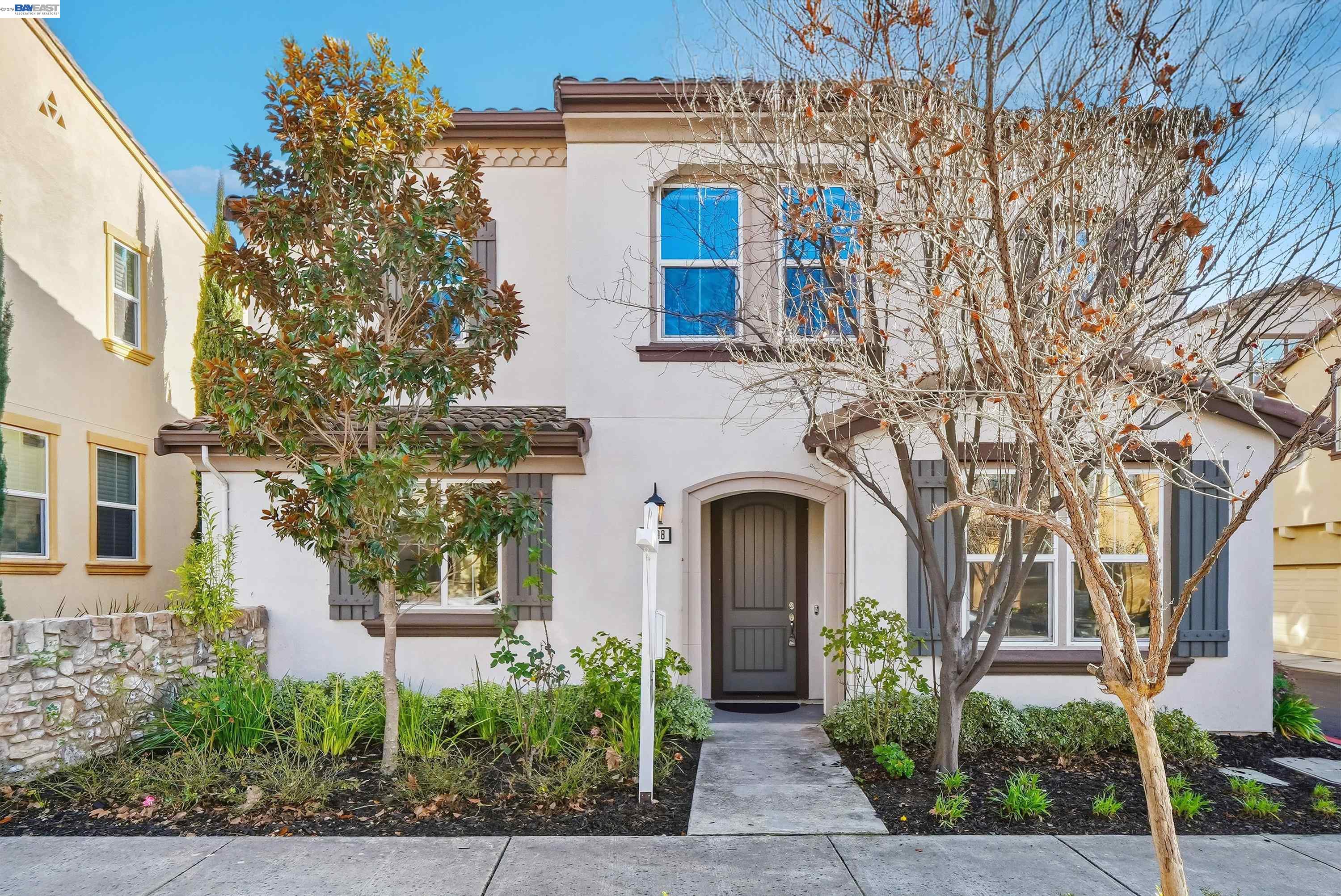 3198 Vittoria Loop Dublin, CA 94568 - Photo 1 of 1 front view of a house with a garden