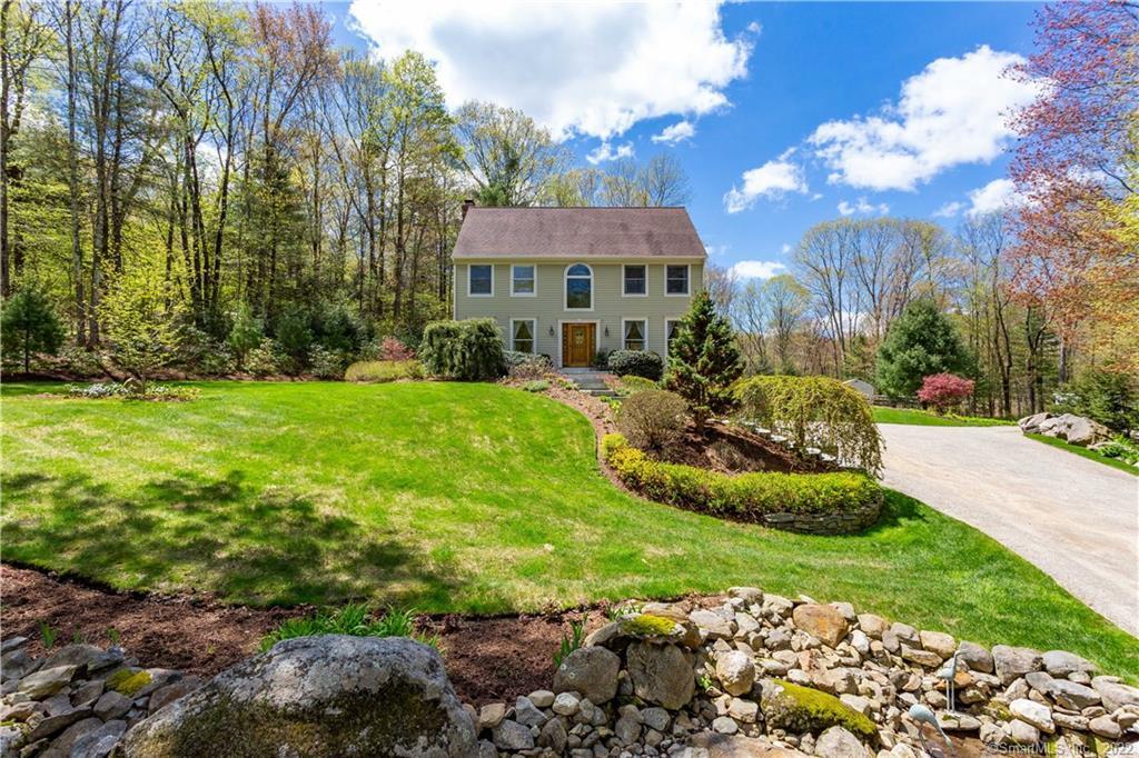 115 Behrens Road New Hartford, CT 06057 - Photo 1 of 1 a front view of a house with garden
