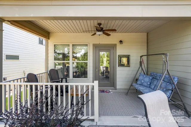 a view of a livingroom with furniture and windows