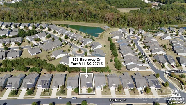 a sign that is sitting in front of flowers