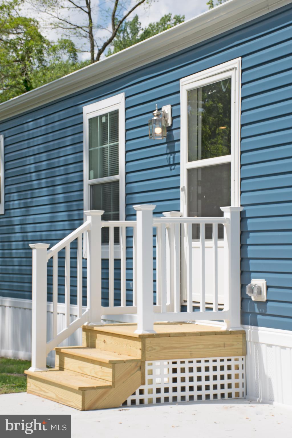68 Friars Lane, Unit 68 Hartly, DE 19953 - Photo 4 of 18 a view of a house with a door and a window