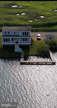 a view of a terrace with a yard