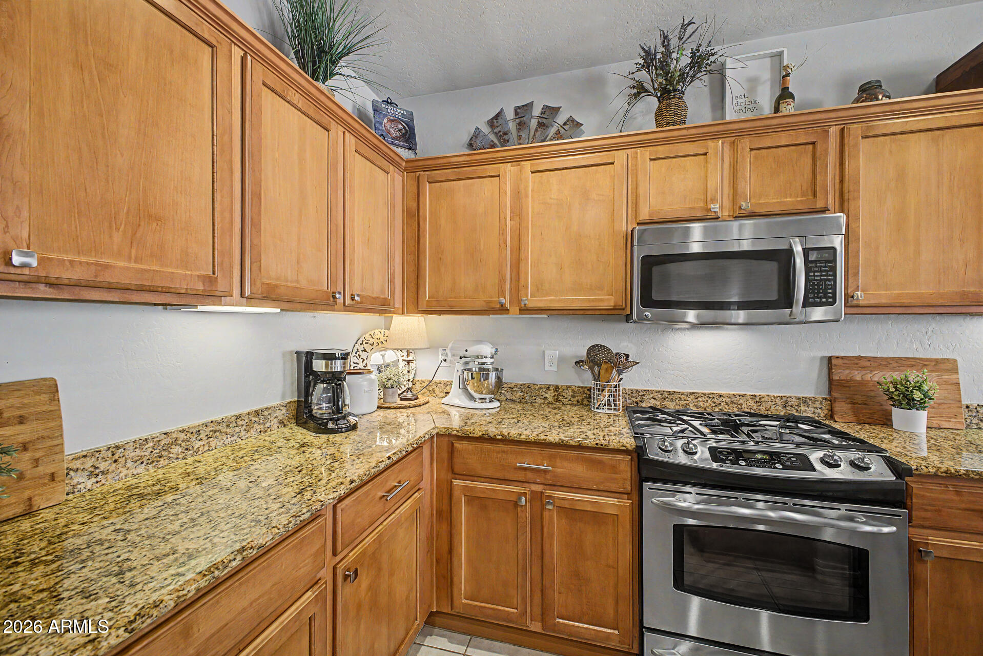 21052 West White Rock Road Buckeye, AZ 85396 - Photo 25 of 40 Kitchen with gas range