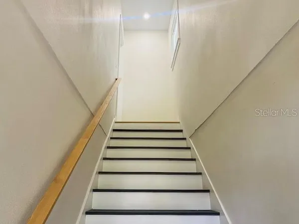 a view of kitchen with wooden floor